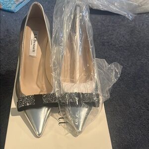 LK Bennett Silver Pointed Toe Heels with suede embellished bow. NIB
